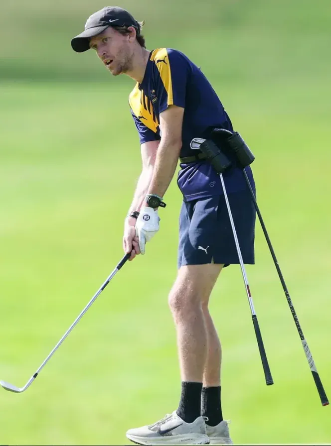 A homemade Hogan Holster speedgolf club carrier.