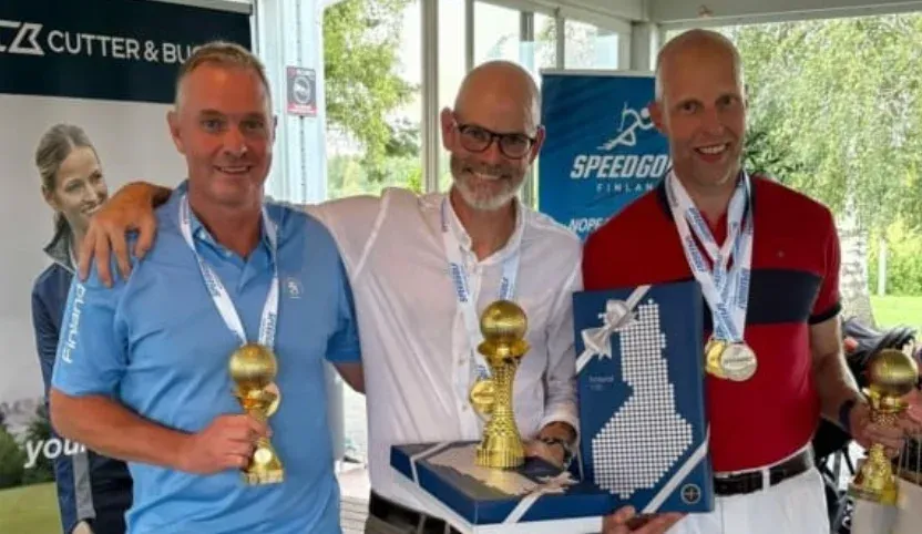 Senior speedgolf medalists holding trophies after a tournament