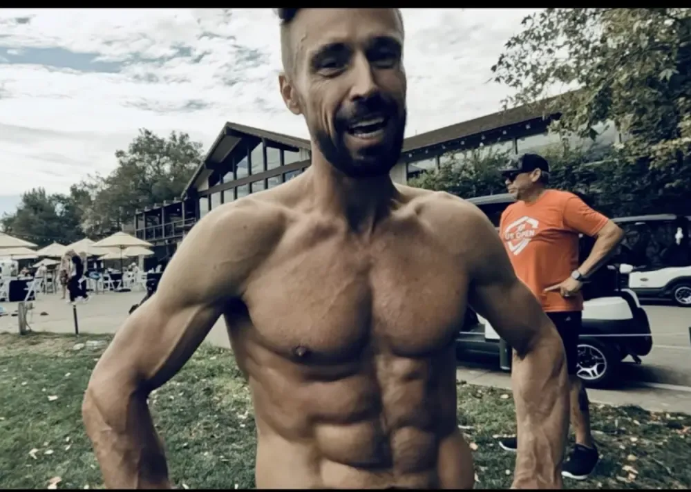James Hardy shirtless after a round at the U.S. Speedgolf Open