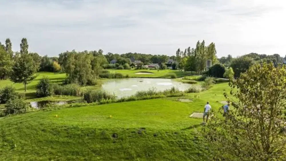 View across the water at Golfclub De Wijnvelden in Meerdonk, Belgium